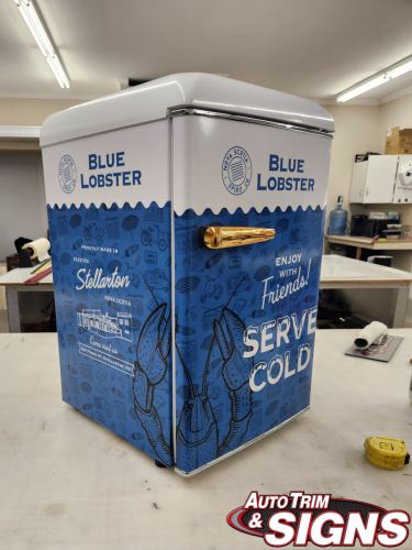Full wrap mini fridge, text says Blue Lobster pomo for a local store