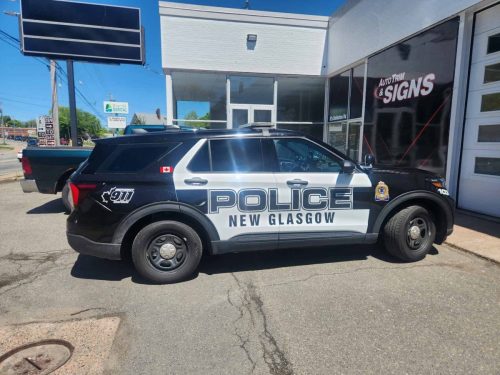 New Glasgow Police SUV with custom police graphics parked outside Auto Trim  Signs in New Glasgow.