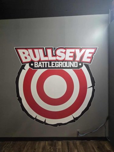 Large red and white target graphic with the Bullseye Battleground logo above.